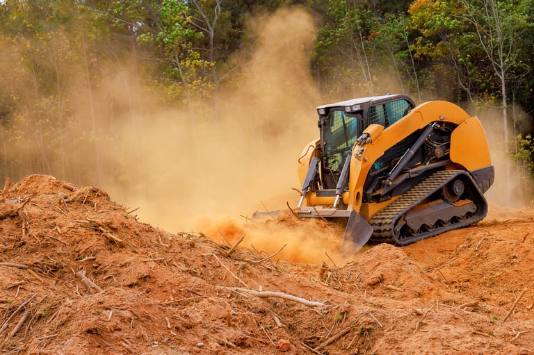 Skid steer land clearing